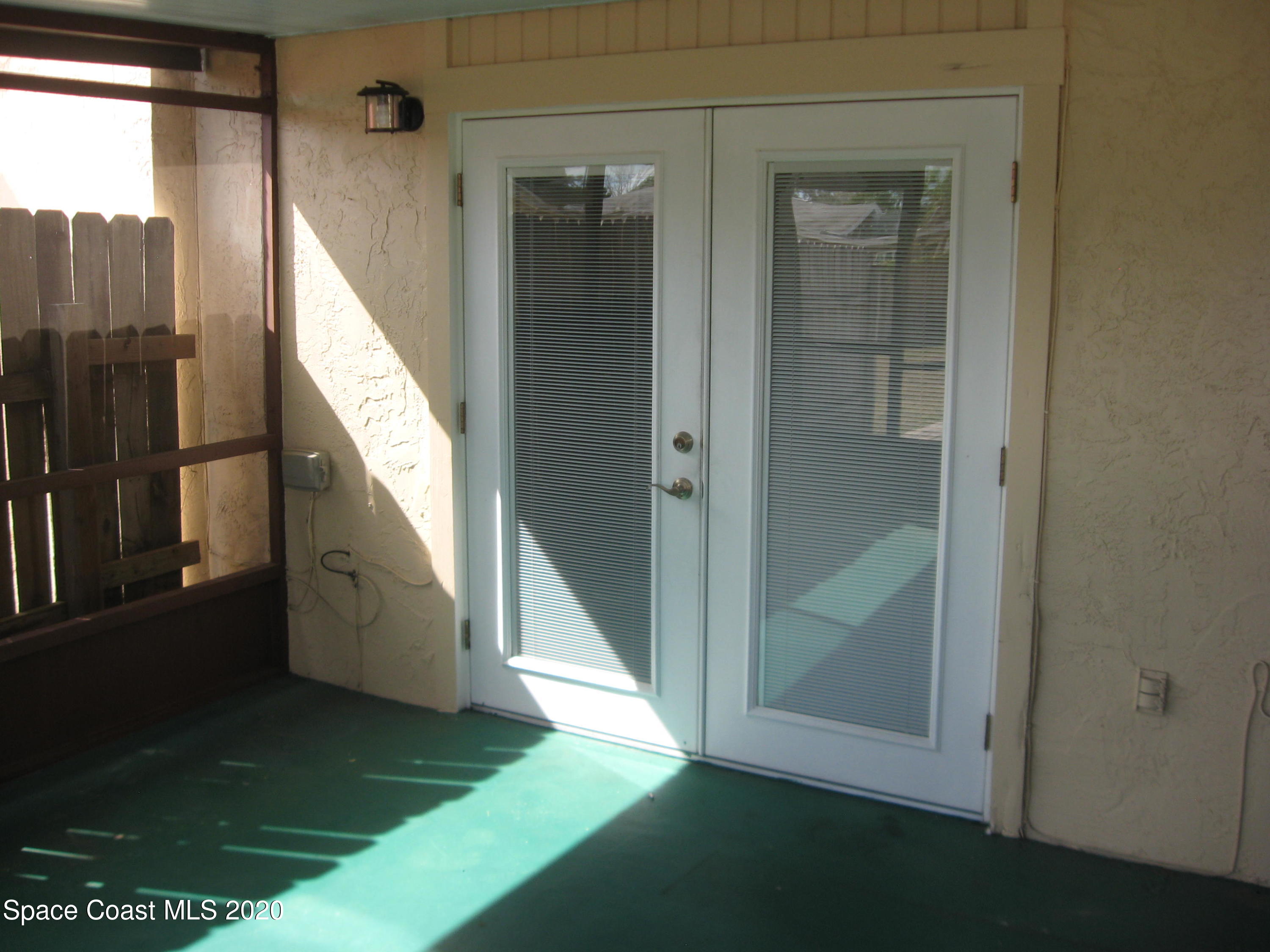 4795 Sisson Road Titusville, FL 32780 - Photo 3 of 27 French Doors with Built In Shades