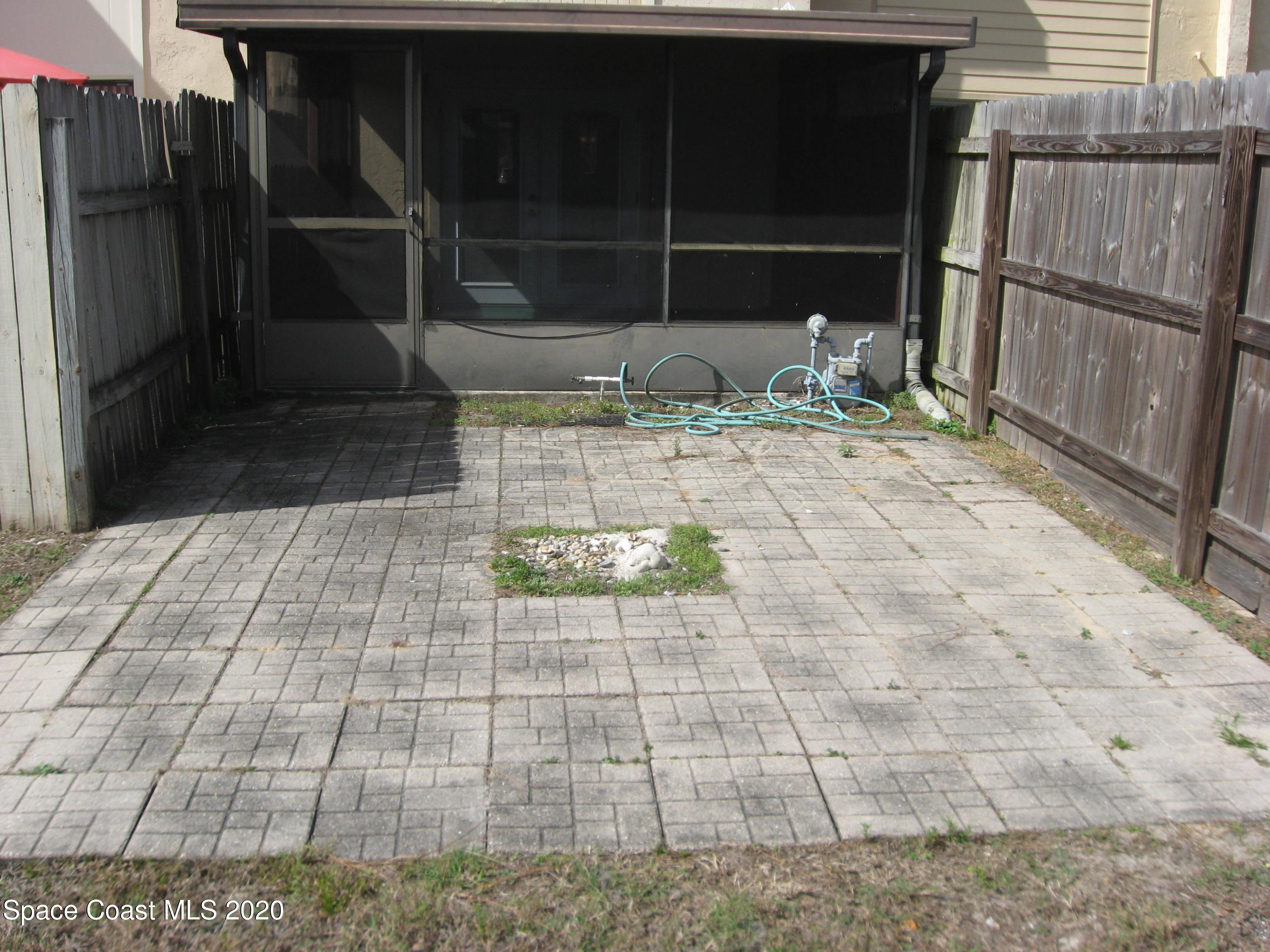 4795 Sisson Road Titusville, FL 32780 - Photo 22 of 27 Back Patio with Pavers