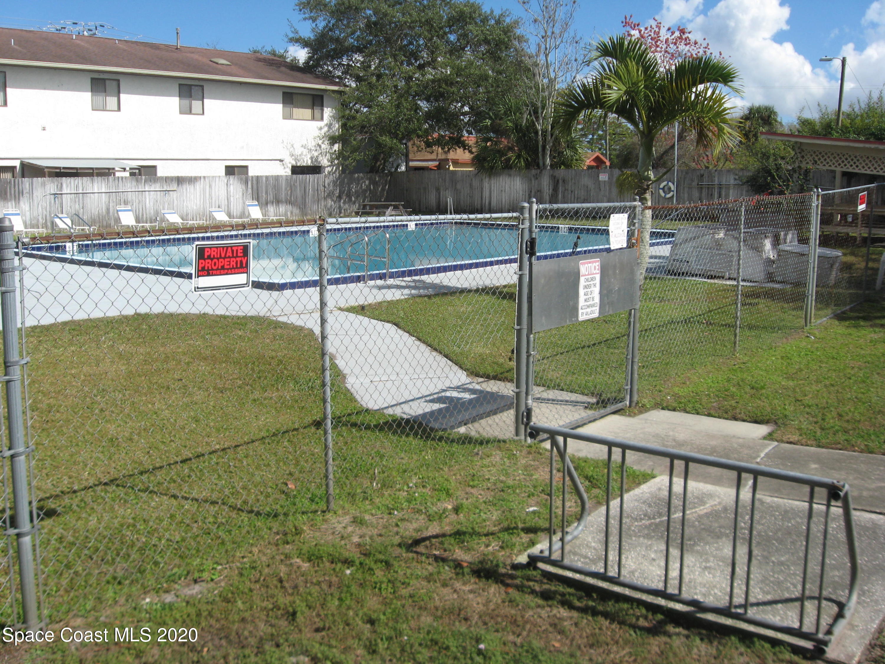 4795 Sisson Road Titusville, FL 32780 - Photo 24 of 27 Gated Pool Area