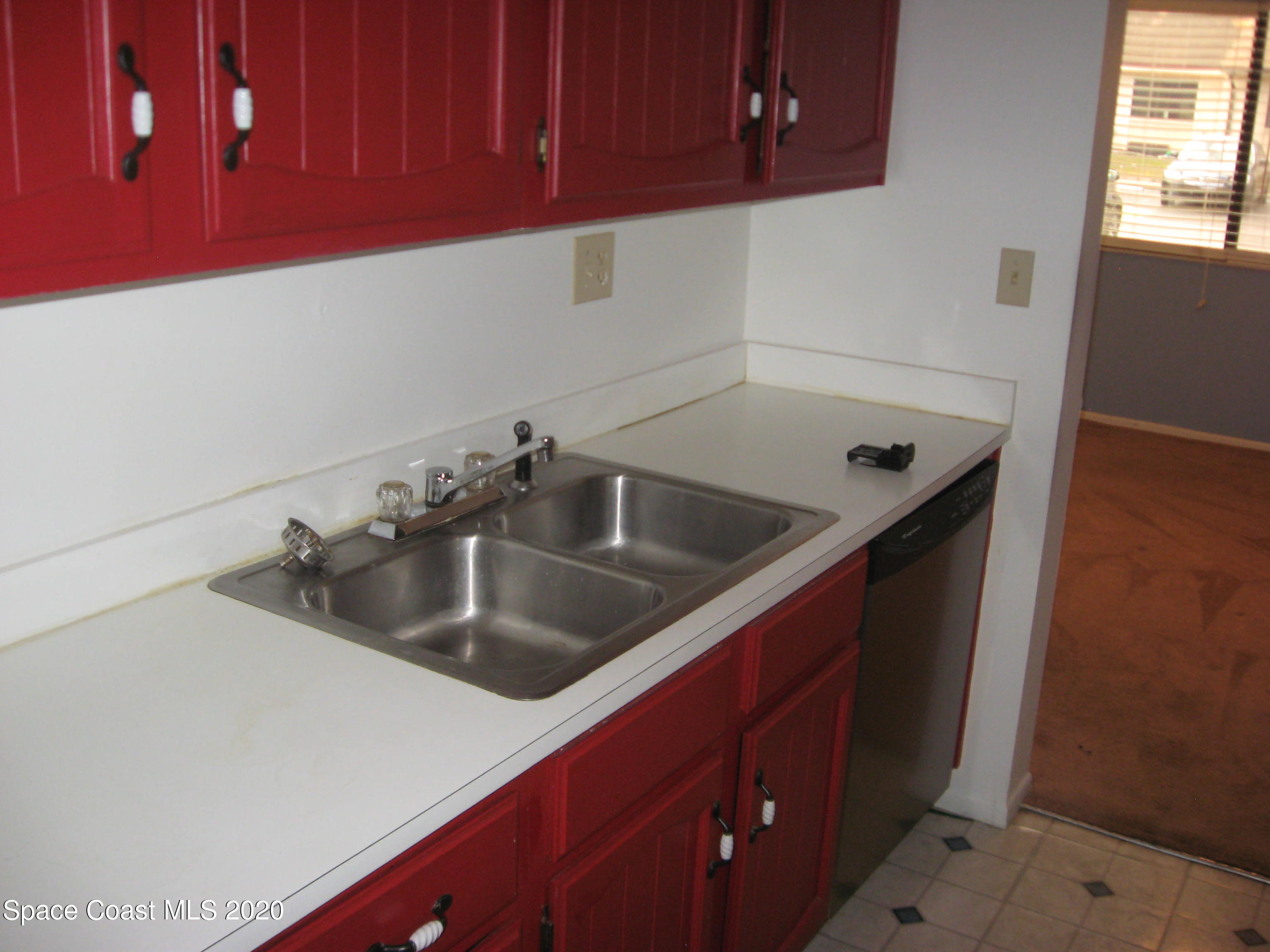 4795 Sisson Road Titusville, FL 32780 - Photo 9 of 27 Pass-through Kitchen