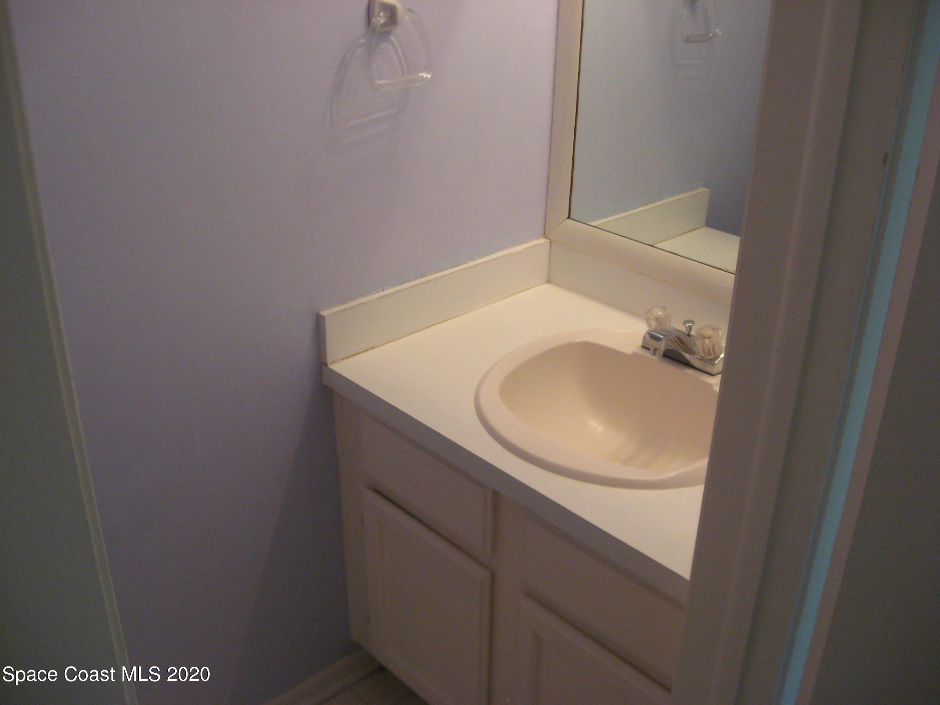 4795 Sisson Road Titusville, FL 32780 - Photo 10 of 27 Half Bath 1