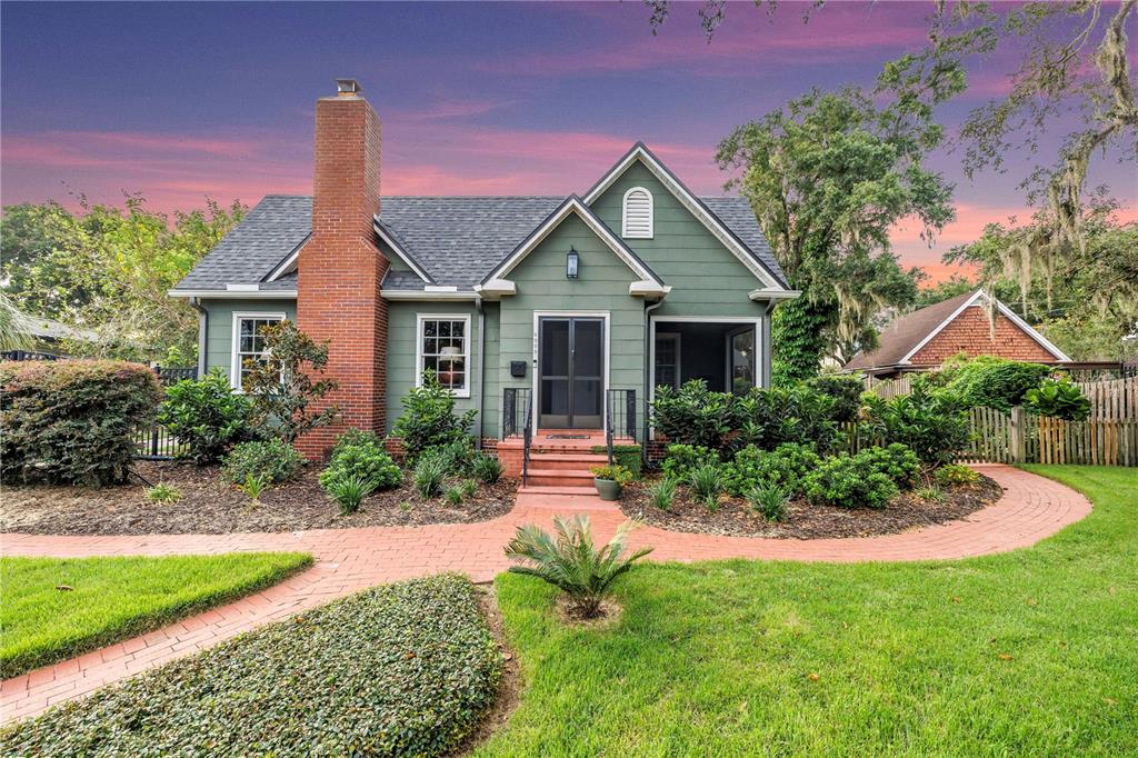 6009 Roberta Circle Tampa, FL 33604 - Photo 1 of 1 a front view of a house with a yard