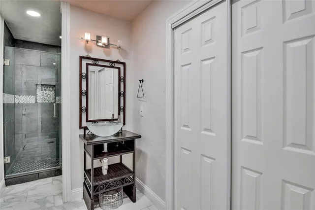 a room with chairs and mirror