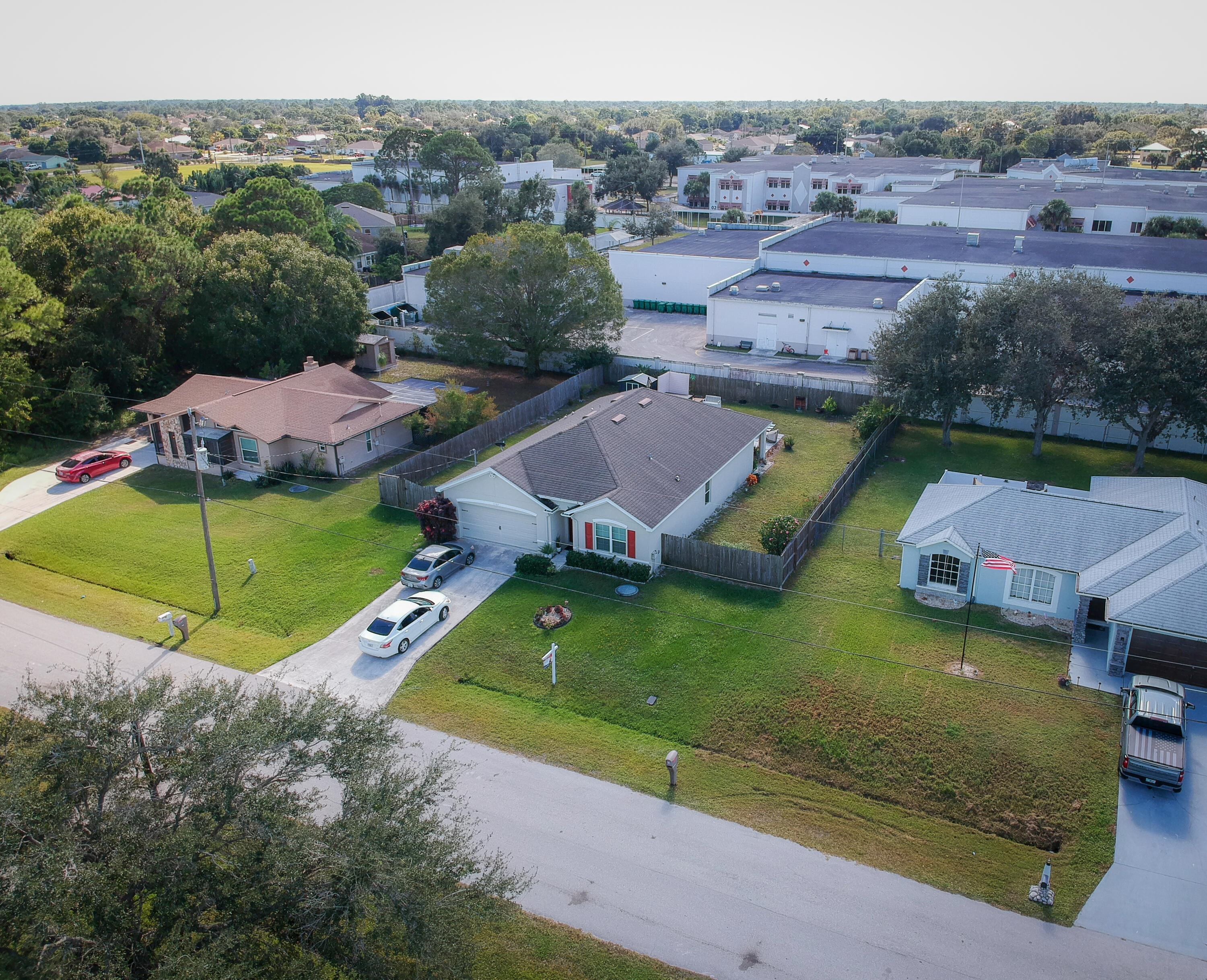 1162 Southwest Coleman Avenue Port St. Lucie, FL 34953 - Photo 3 of 27 an aerial view of a house