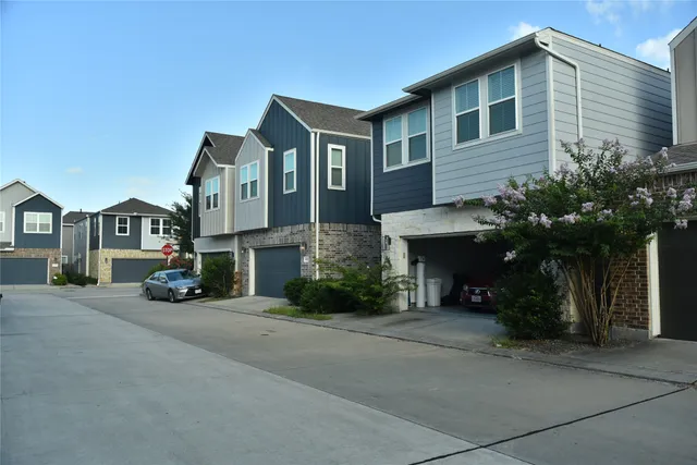 a view of a street with cars