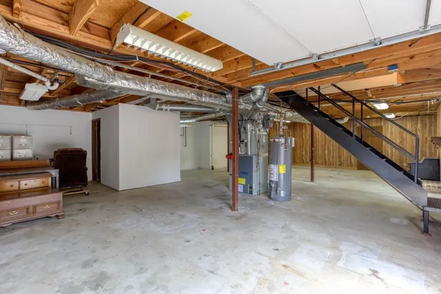 a swimming pool with trees in the background