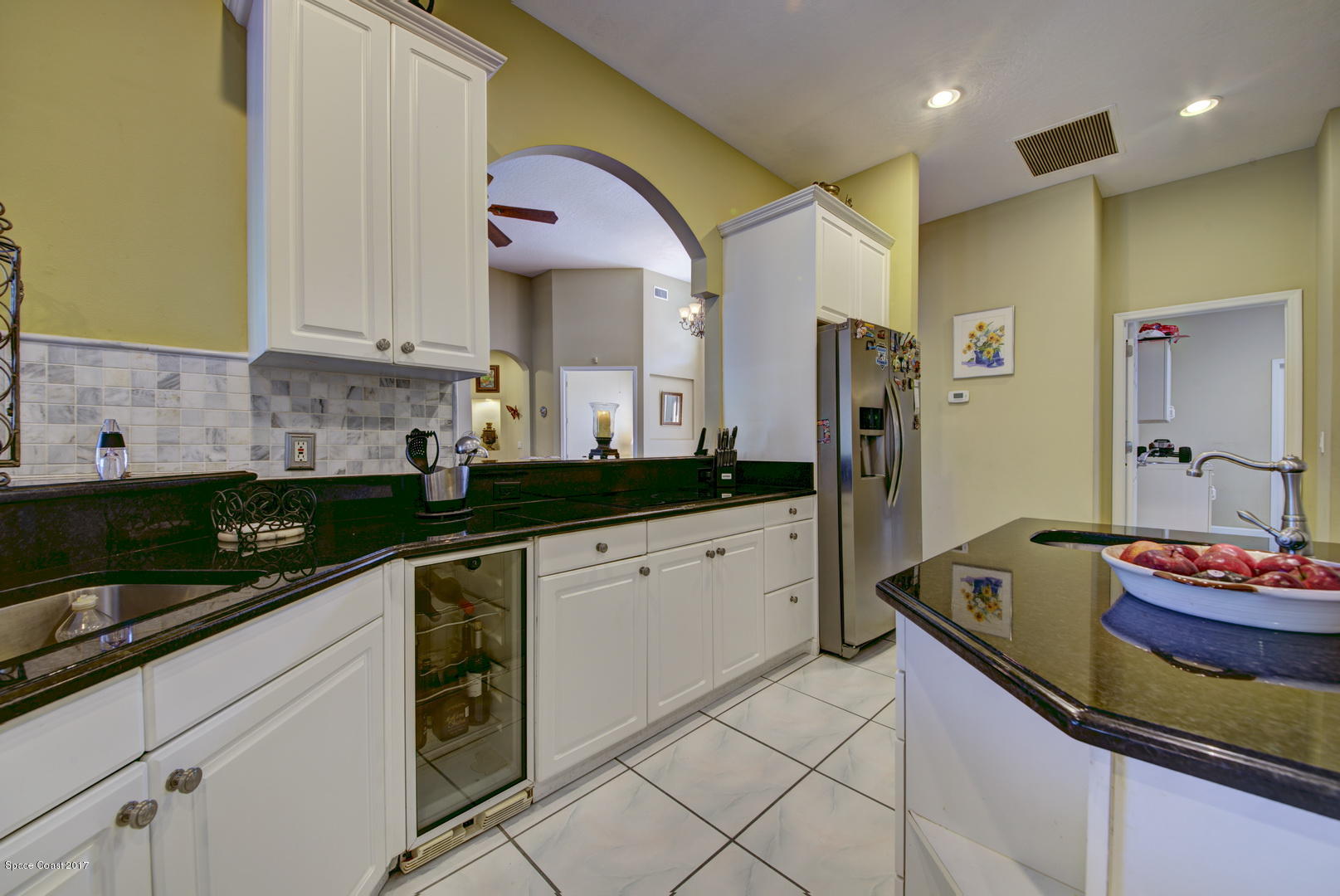 4055 Turtle Mound Road Melbourne, FL 32934 - Photo 12 of 80 Kitchen with Wine Cooler