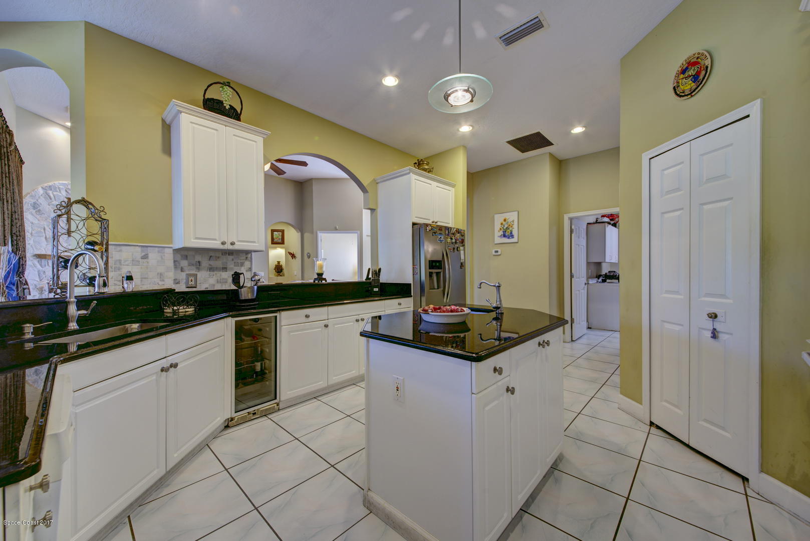 4055 Turtle Mound Road Melbourne, FL 32934 - Photo 13 of 80 Kitchen with Island