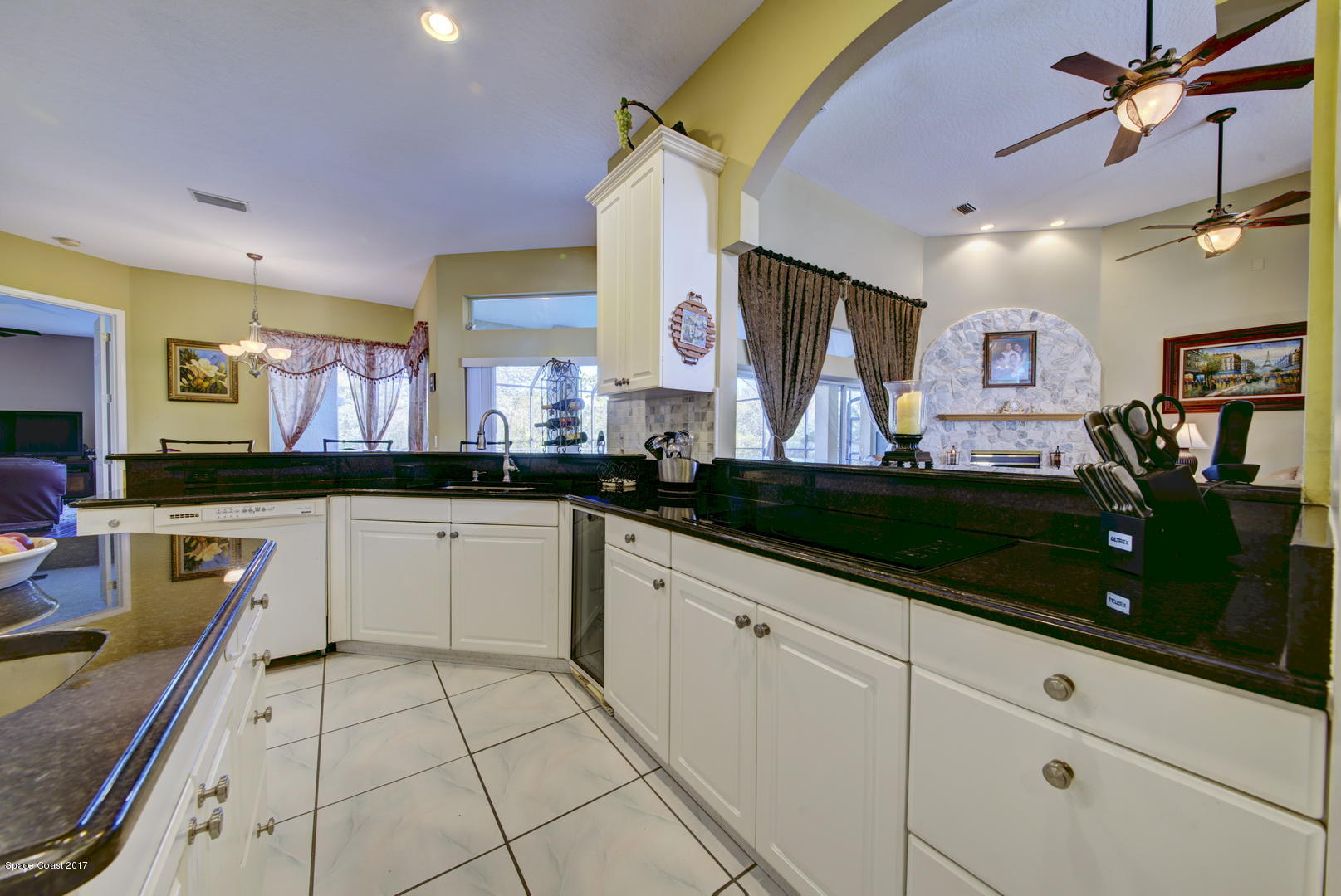 4055 Turtle Mound Road Melbourne, FL 32934 - Photo 16 of 80 Kitchen with Granite Countertops