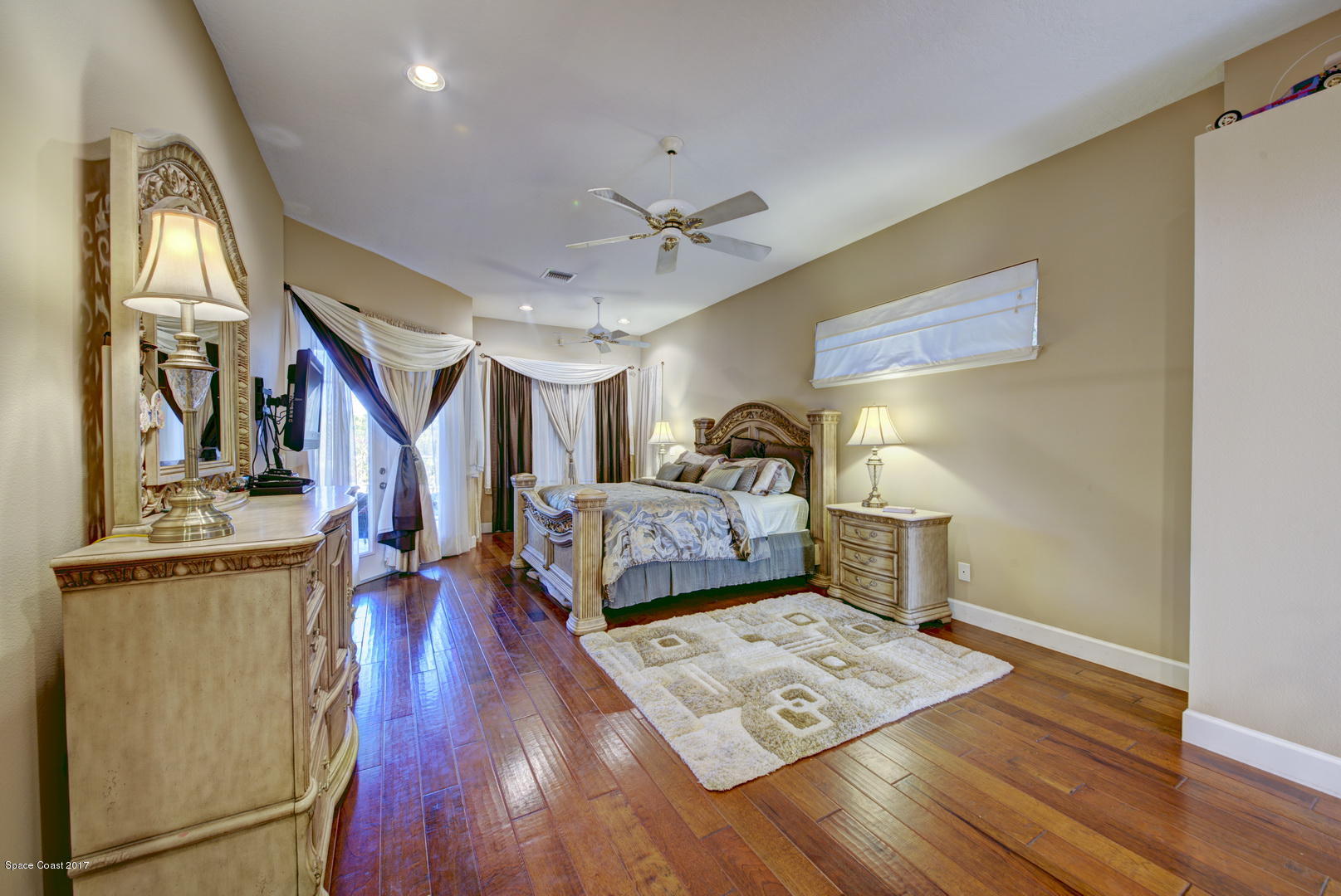 4055 Turtle Mound Road Melbourne, FL 32934 - Photo 30 of 80 Master Suite w/ Hardwood Floor