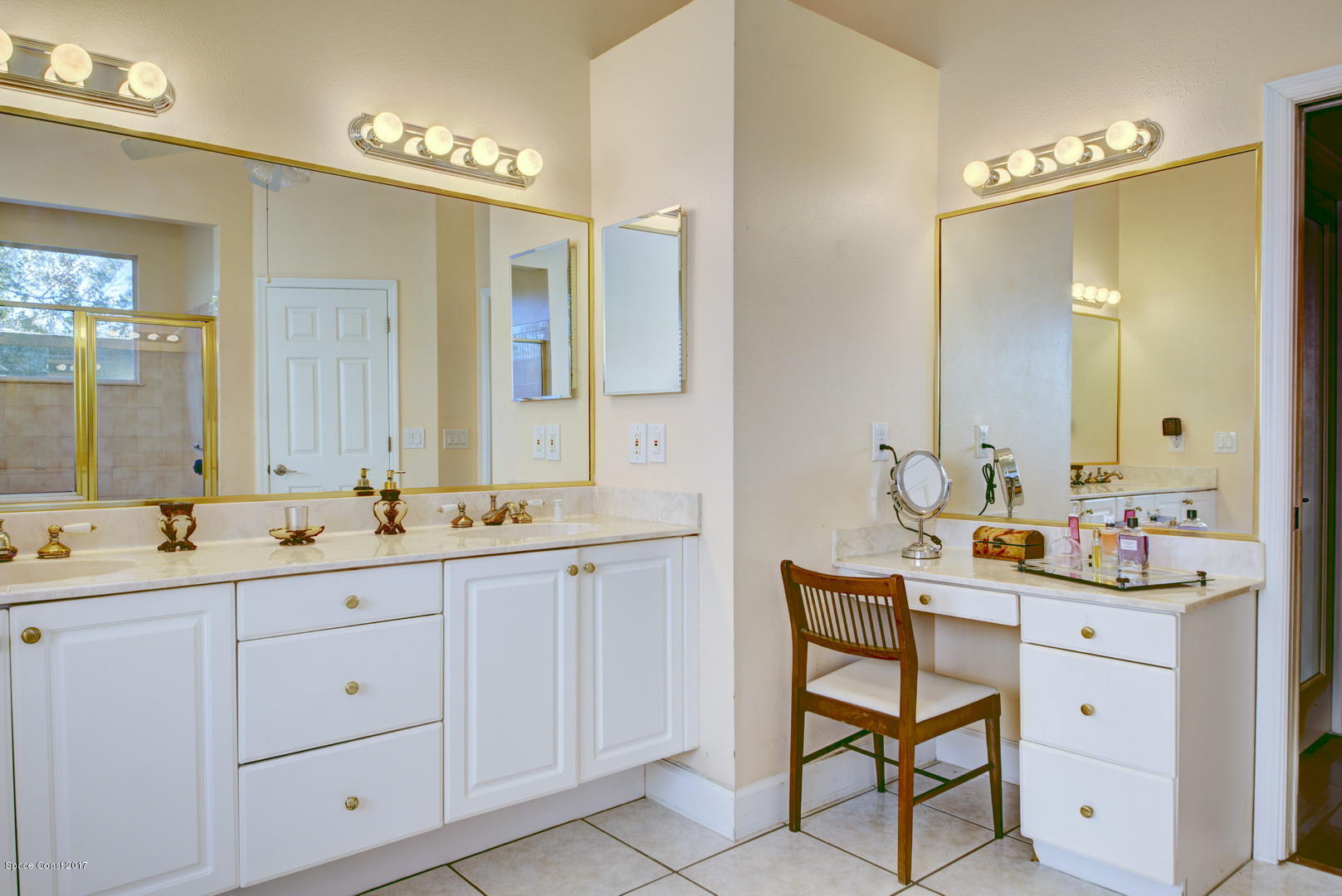 4055 Turtle Mound Road Melbourne, FL 32934 - Photo 36 of 80 Master Bath w/ Her Vanity