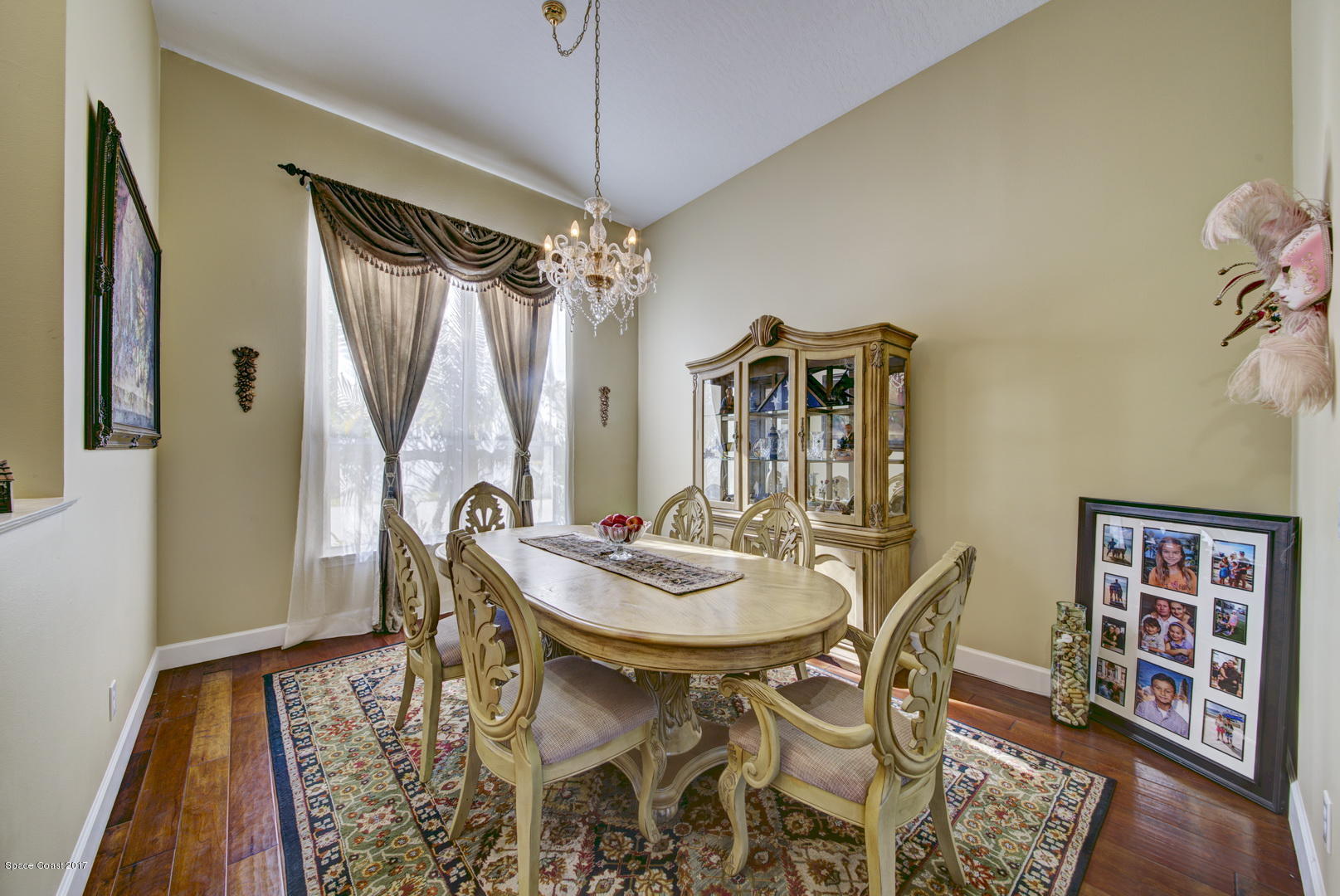 4055 Turtle Mound Road Melbourne, FL 32934 - Photo 5 of 80 Formal Dining Room & Hardwood Floors