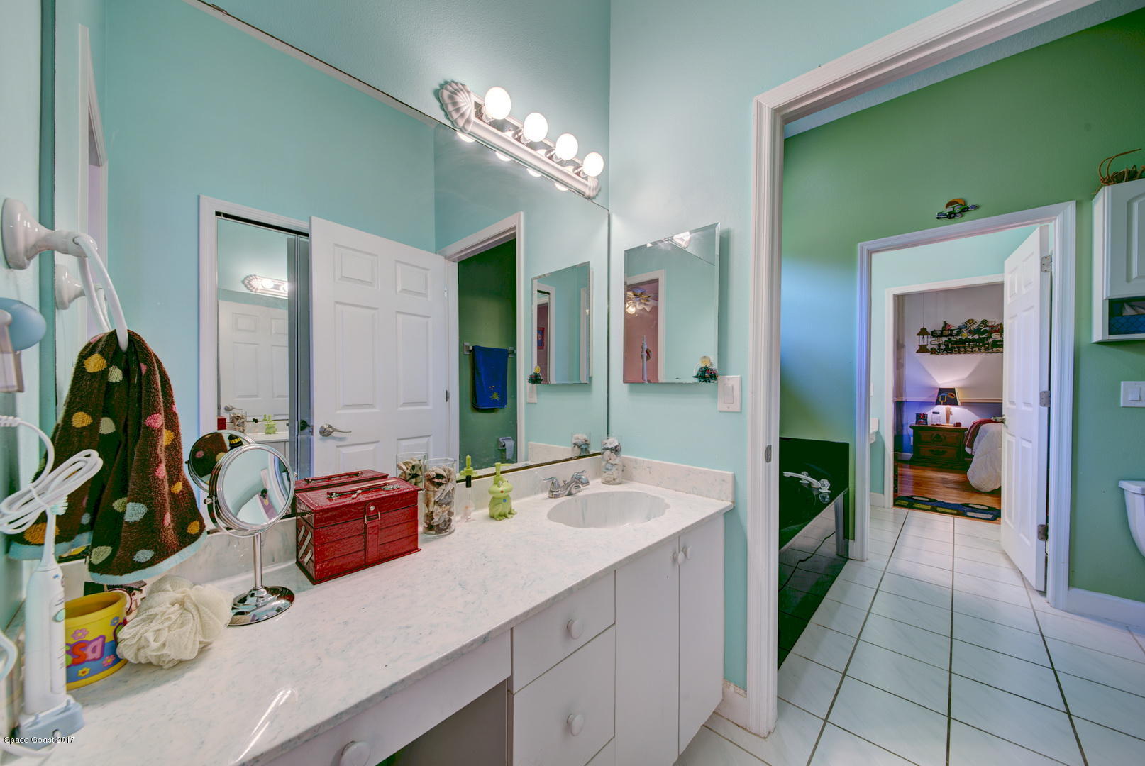 4055 Turtle Mound Road Melbourne, FL 32934 - Photo 41 of 80 Bathroom 2 Separate Vanities