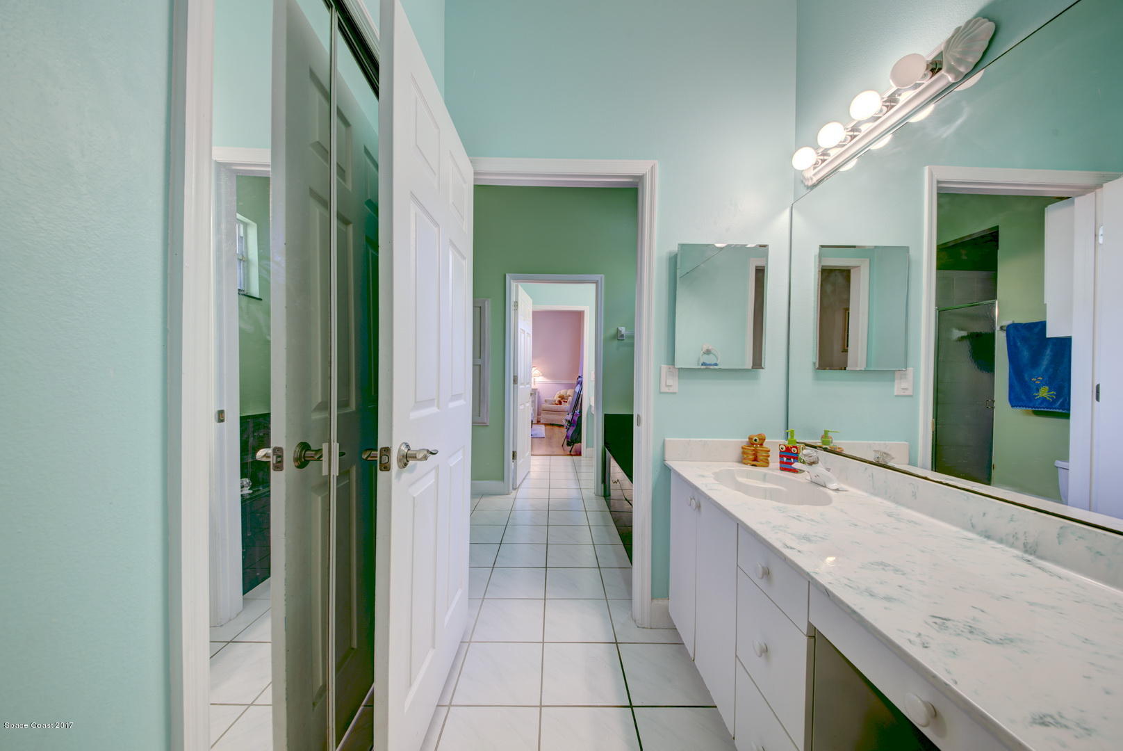 4055 Turtle Mound Road Melbourne, FL 32934 - Photo 46 of 80 Bathroom 2 Vanity & Closet