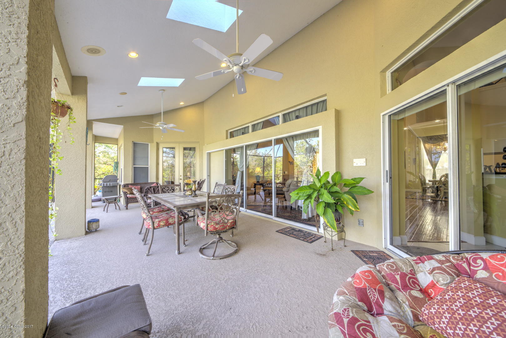 4055 Turtle Mound Road Melbourne, FL 32934 - Photo 56 of 80 Covered Patio with Sky Lights