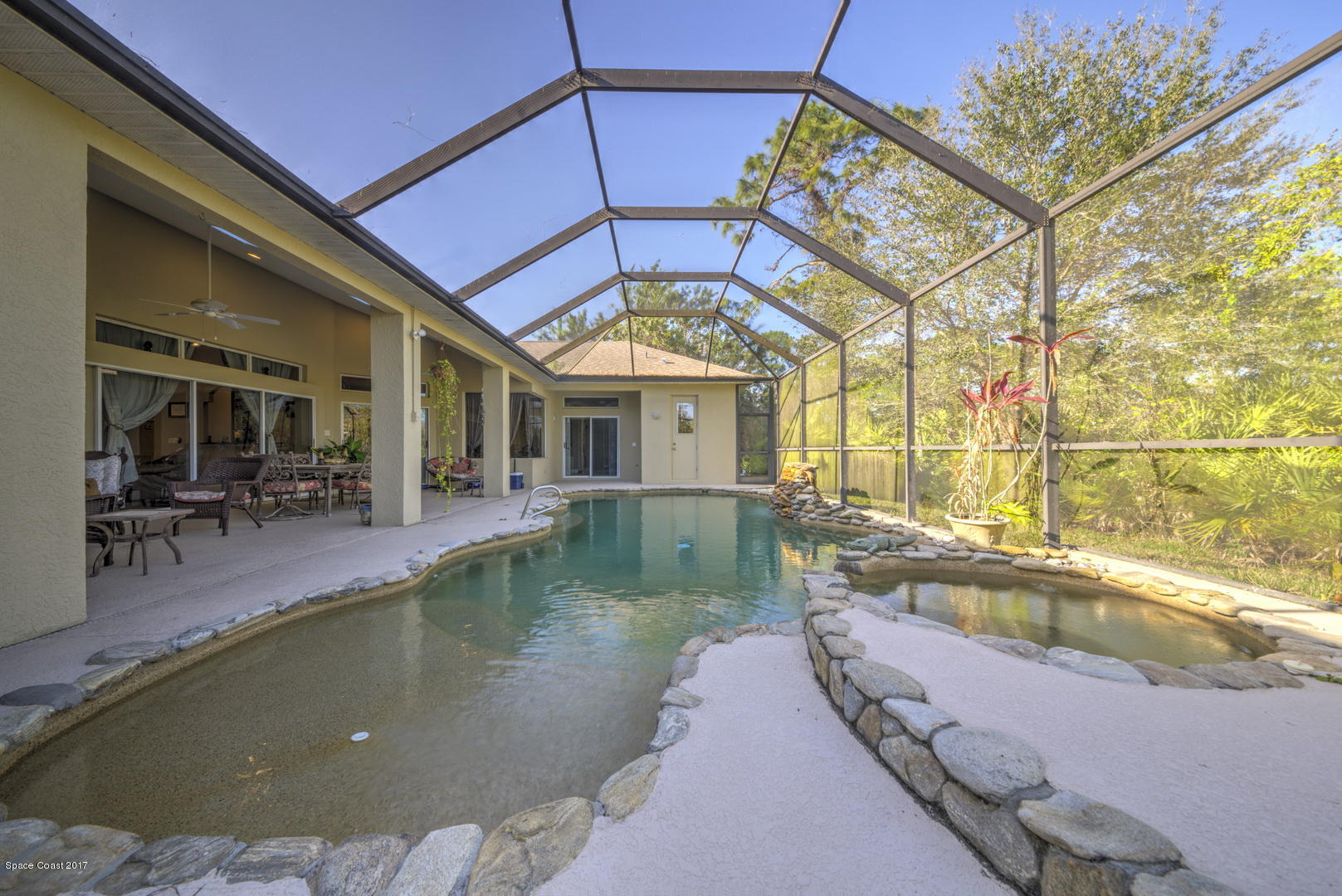 4055 Turtle Mound Road Melbourne, FL 32934 - Photo 62 of 80 Pool with pebble bottom