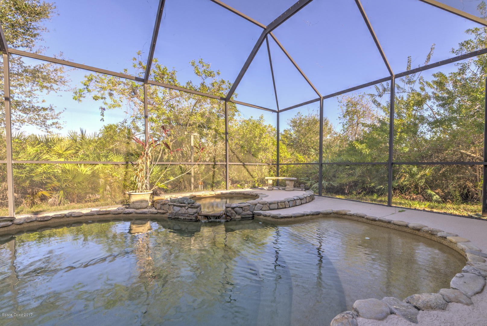 4055 Turtle Mound Road Melbourne, FL 32934 - Photo 63 of 80 Rock accent around pool