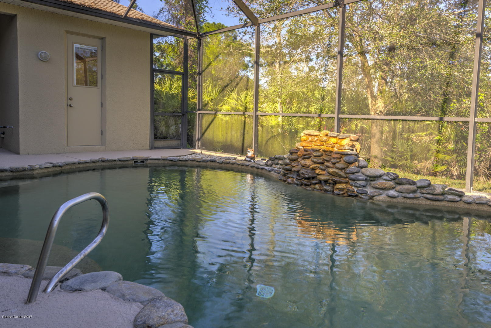 4055 Turtle Mound Road Melbourne, FL 32934 - Photo 64 of 80 Pool with Waterfall