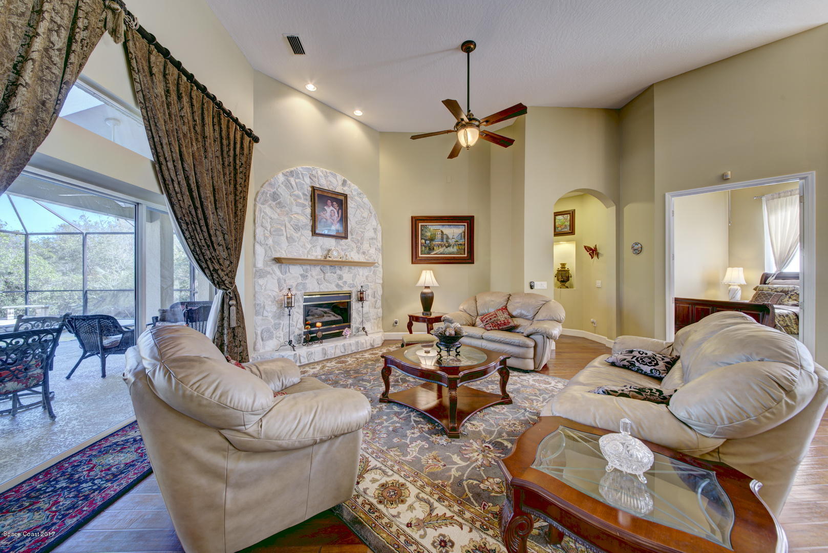 4055 Turtle Mound Road Melbourne, FL 32934 - Photo 8 of 80 Living Room & Stone Fireplace