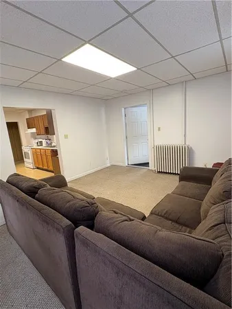 a living room with a couch and a couch