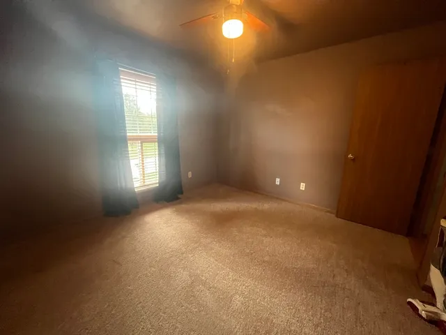 an empty room with windows