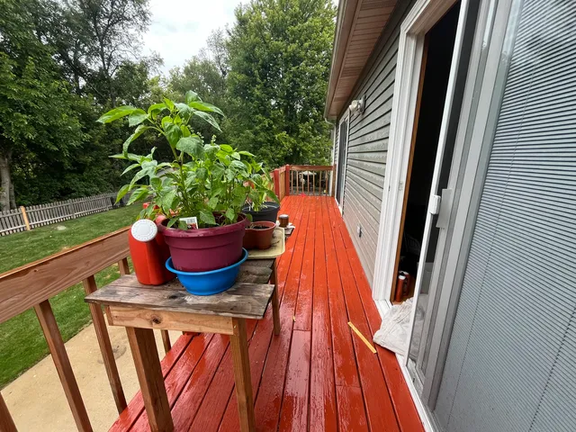 a view of balcony with a potted plant