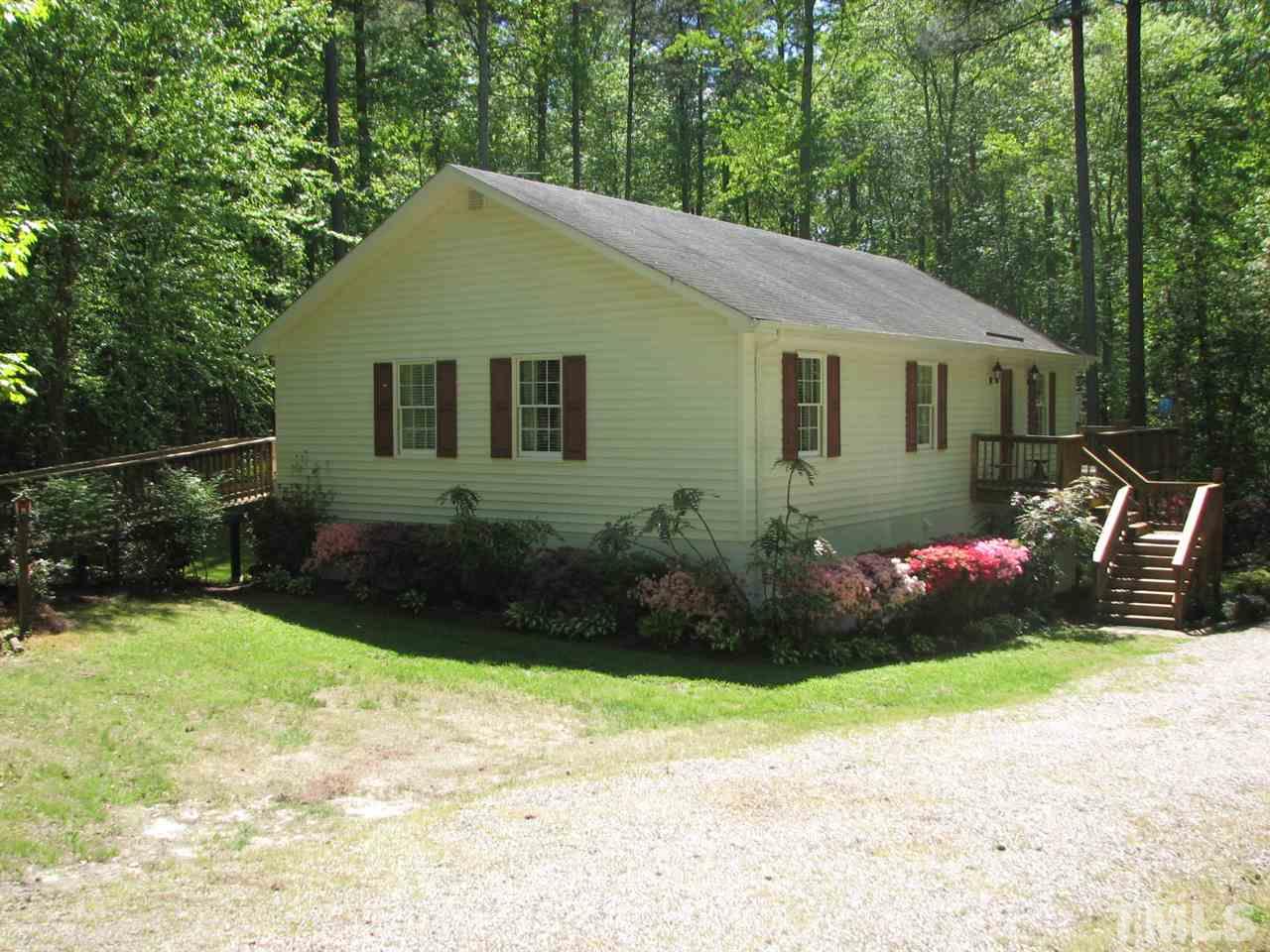 210 Nutbush Road Manson, NC 27553 - Photo 1 of 14 a front view of house with yard and green space