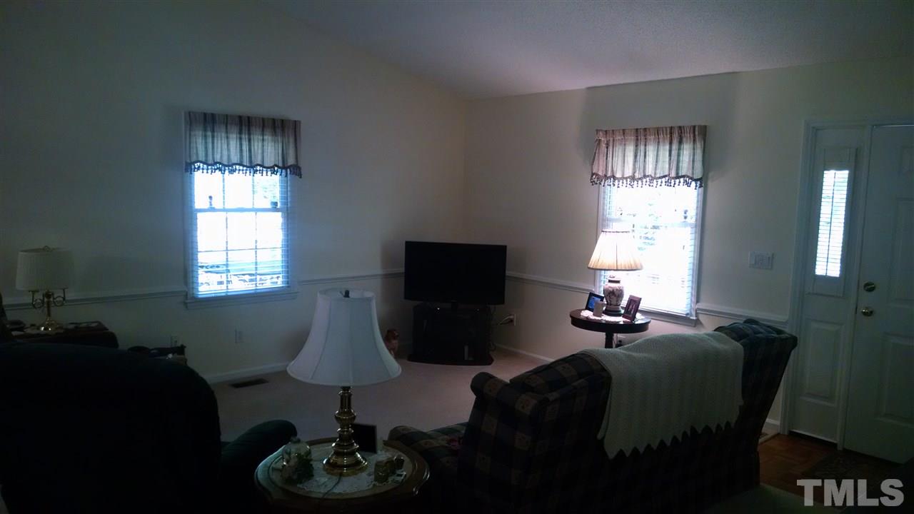 210 Nutbush Road Manson, NC 27553 - Photo 3 of 14 a living room with furniture lamp and window