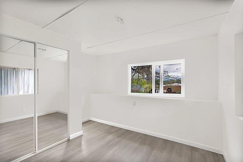 2675 Highway 140 Catheys Valley, CA 95306 - Photo 18 of 53 an empty room with windows