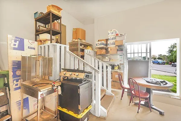 a table and chairs in a kitchen