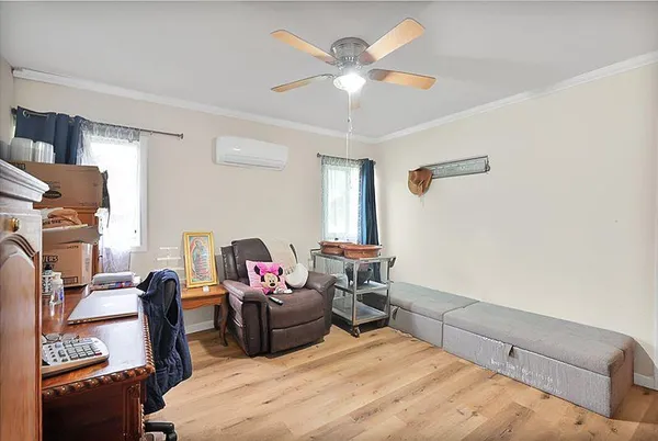 a bedroom with a bed and a table