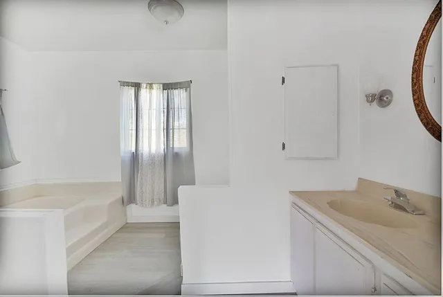 a view of a patio with chairs and tables