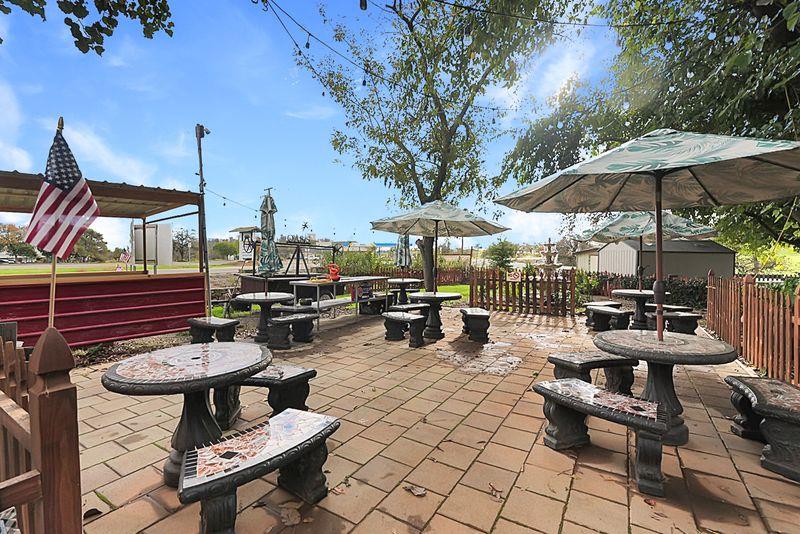 2675 Highway 140 Catheys Valley, CA 95306 - Photo 36 of 53 a view of a patio with chairs and tables