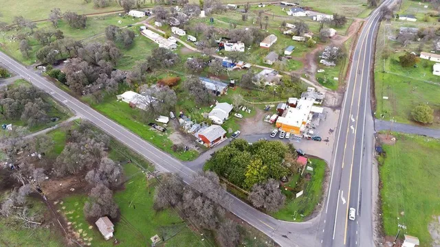 a view of a street with cars