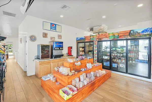 a room with furniture and a wooden floor
