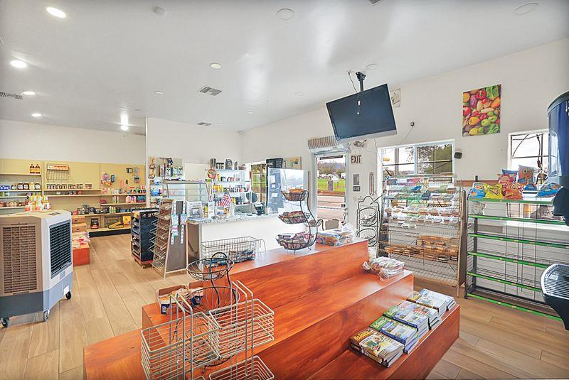 2675 Highway 140 Catheys Valley, CA 95306 - Photo 43 of 53 a room with lots of appliances and furniture