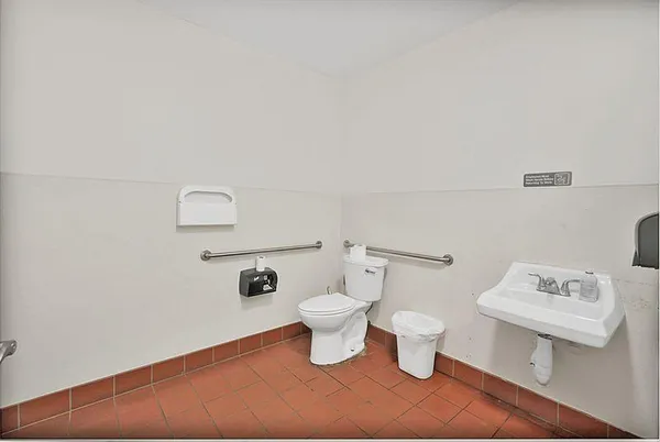 a view of a backyard with chairs