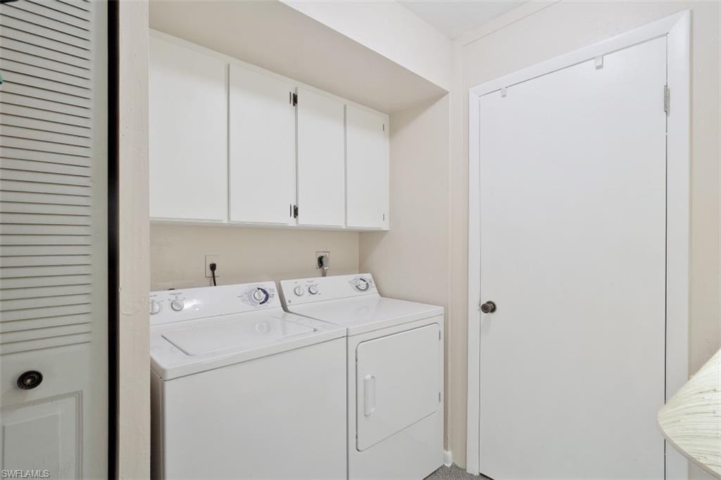 3400 Frosty Way, Unit 4704 Naples, FL 34112 - Photo 15 of 20 a utility room with dryer and washer