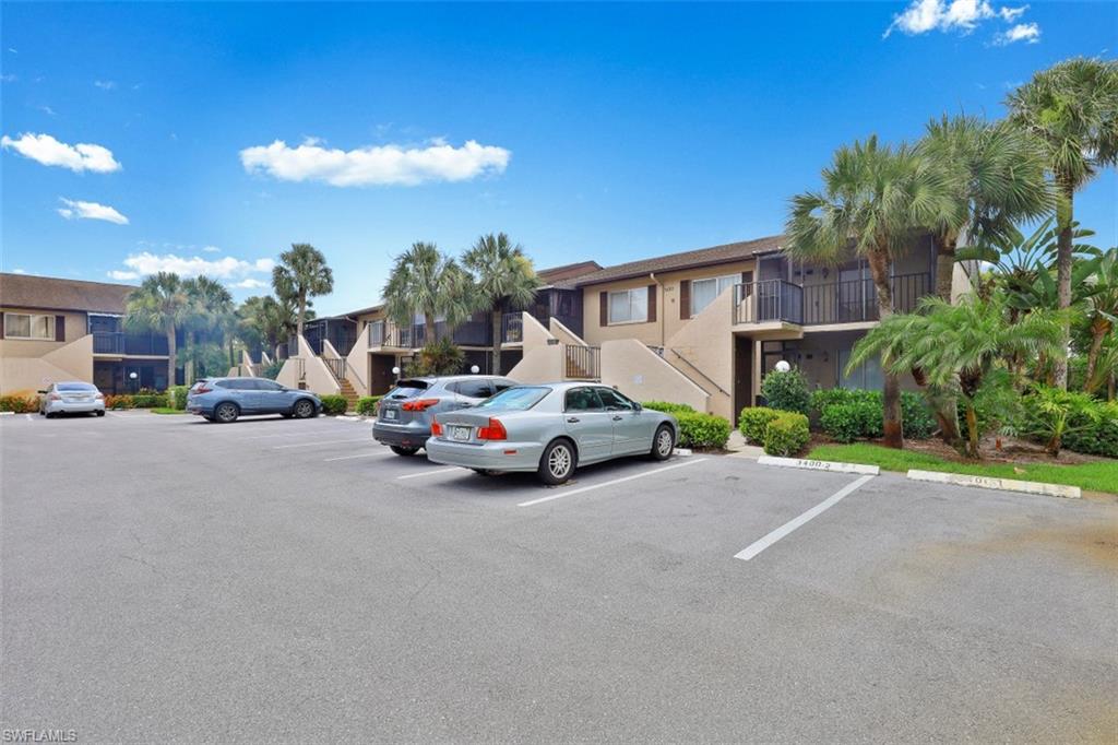 3400 Frosty Way, Unit 4704 Naples, FL 34112 - Photo 18 of 20 a view of a street