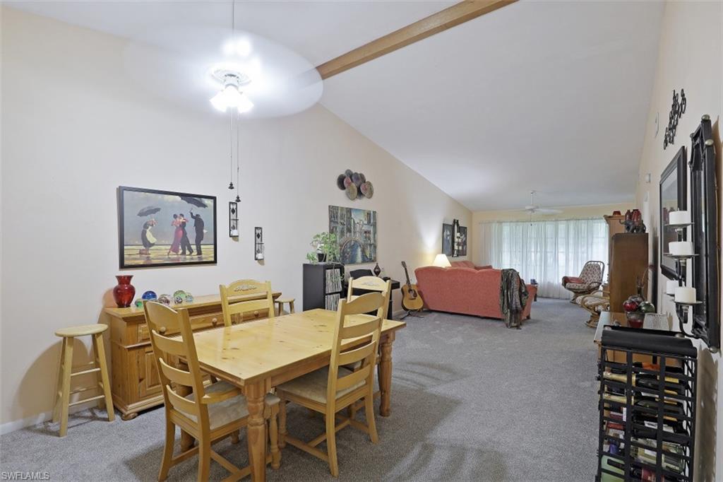 3400 Frosty Way, Unit 4704 Naples, FL 34112 - Photo 2 of 20 a dining room with furniture and window