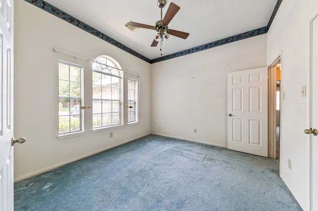 a house view with a backyard space