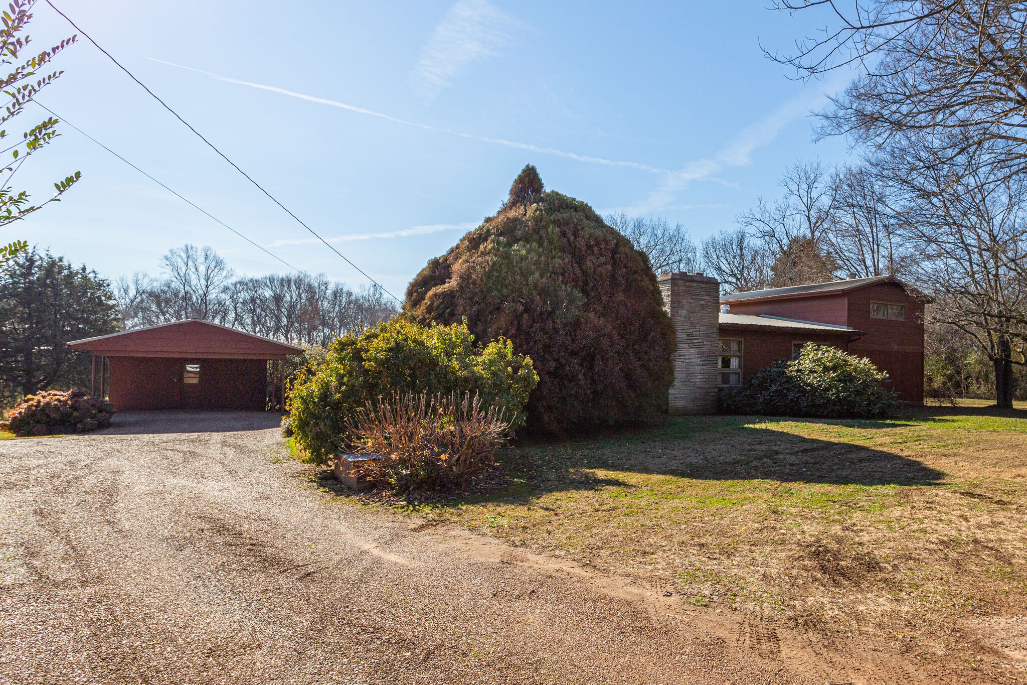 404 Monroe Floyd Road Decherd, TN 37324 - Photo 2 of 44 a view of a backyard of the house