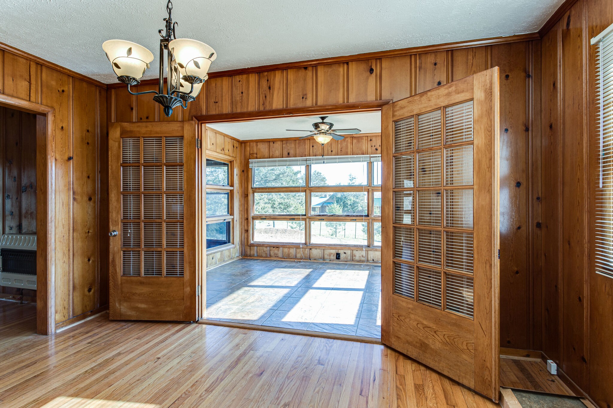 404 Monroe Floyd Road Decherd, TN 37324 - Photo 14 of 44 a view of a room with wooden floor and windows