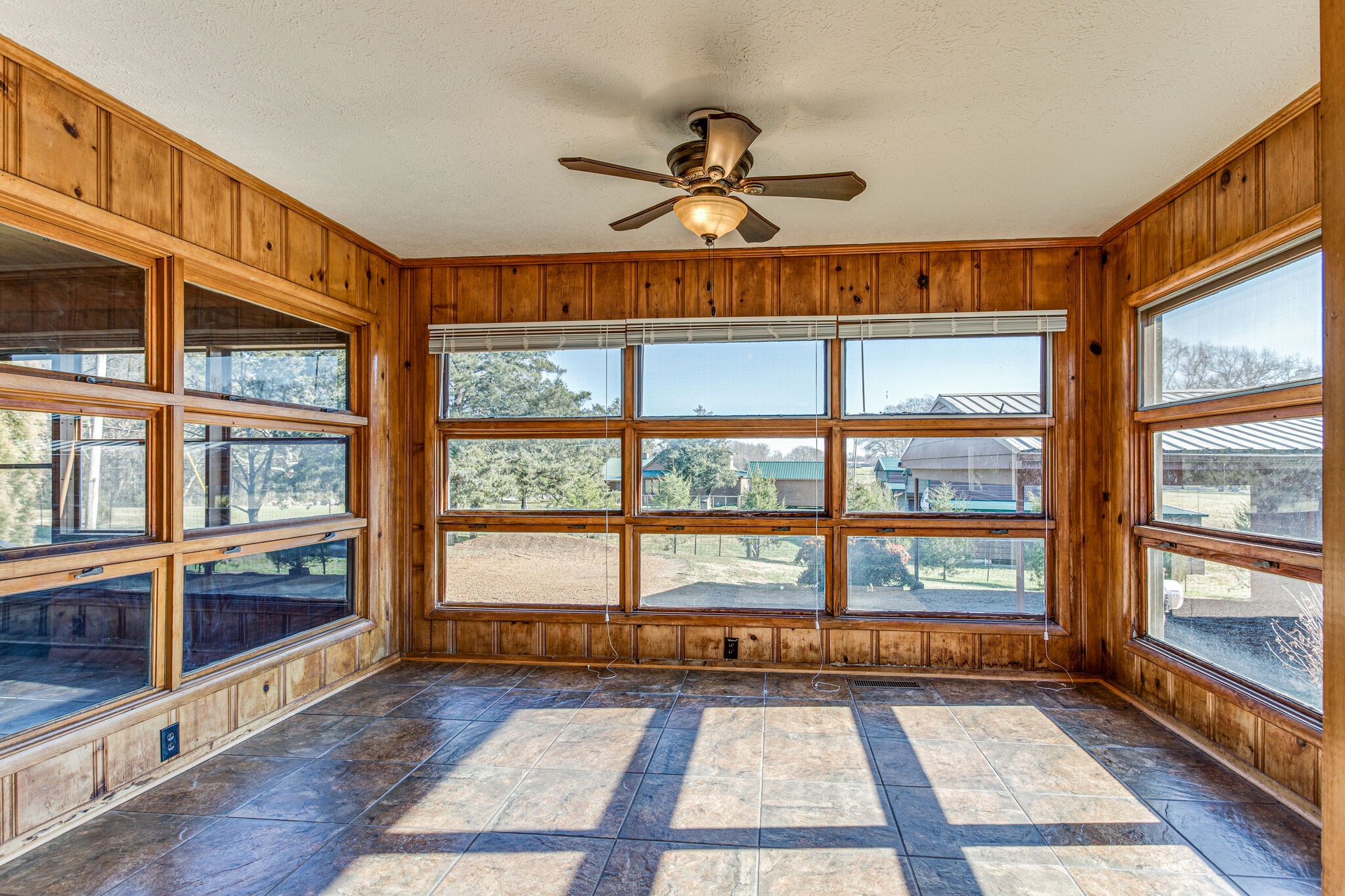 404 Monroe Floyd Road Decherd, TN 37324 - Photo 15 of 44 a view of an empty room with wooden floor and a window