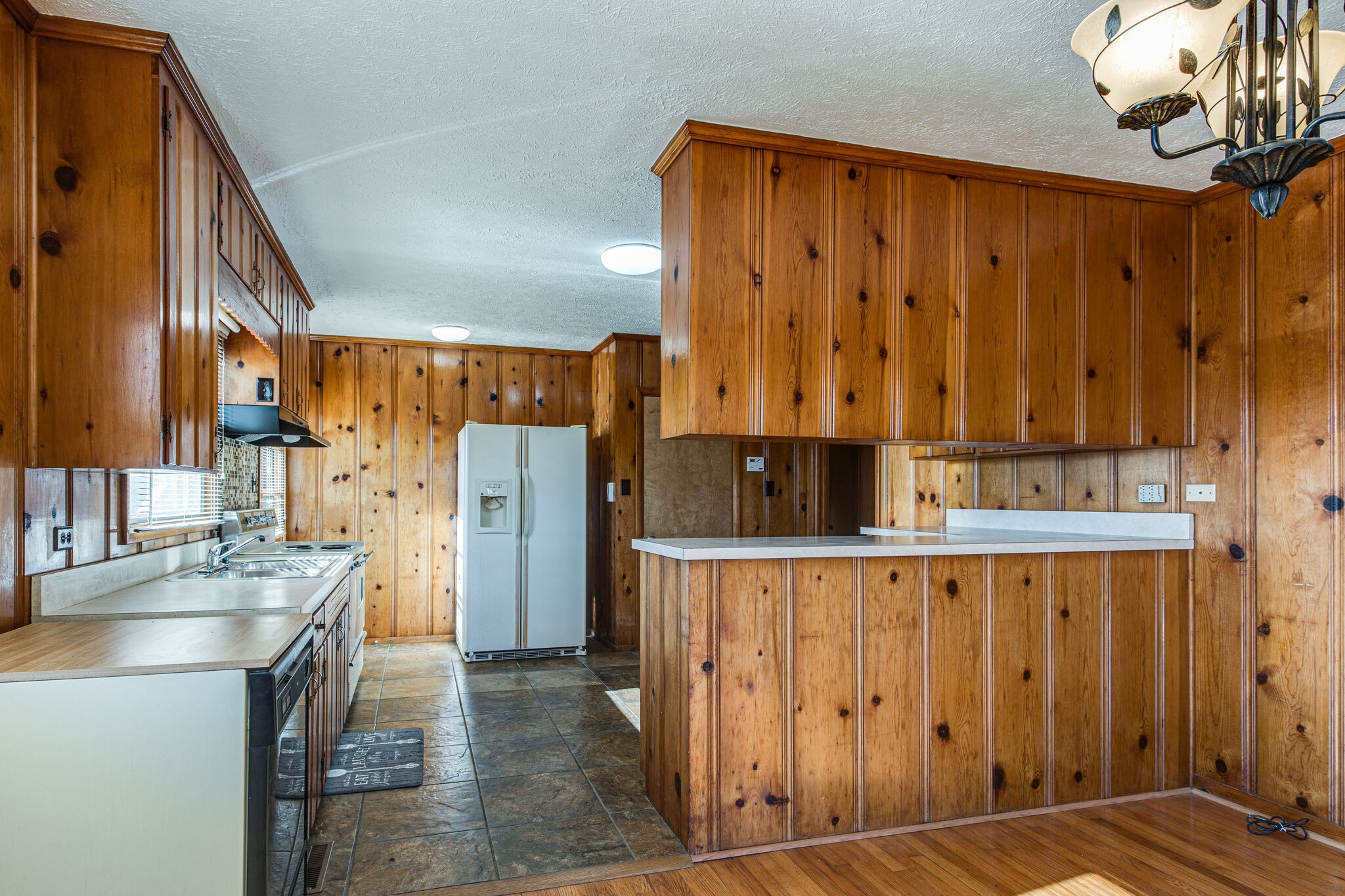 404 Monroe Floyd Road Decherd, TN 37324 - Photo 17 of 44 a view of kitchen with wooden floor