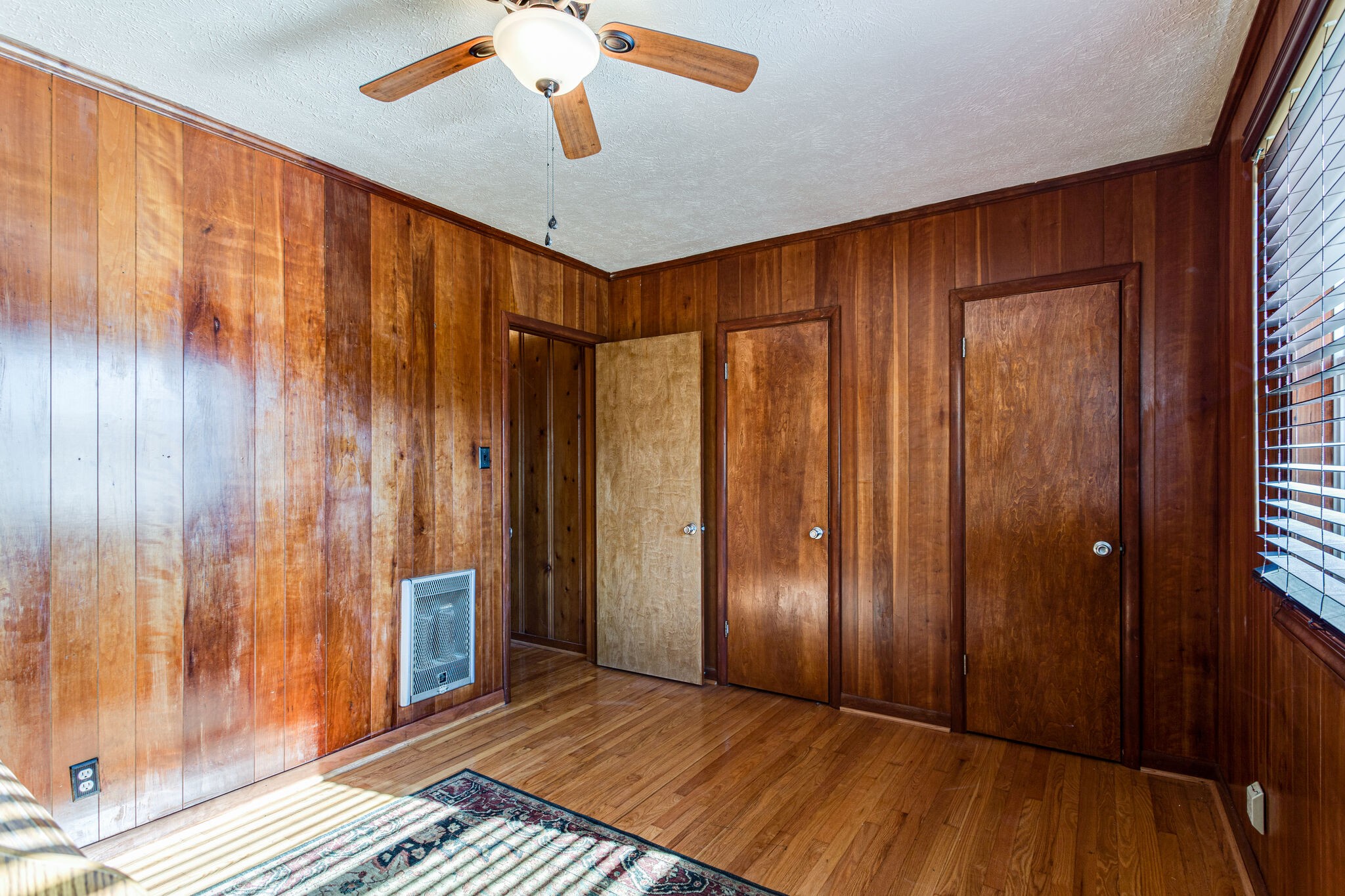 404 Monroe Floyd Road Decherd, TN 37324 - Photo 24 of 44 a view of an empty room with wooden floor