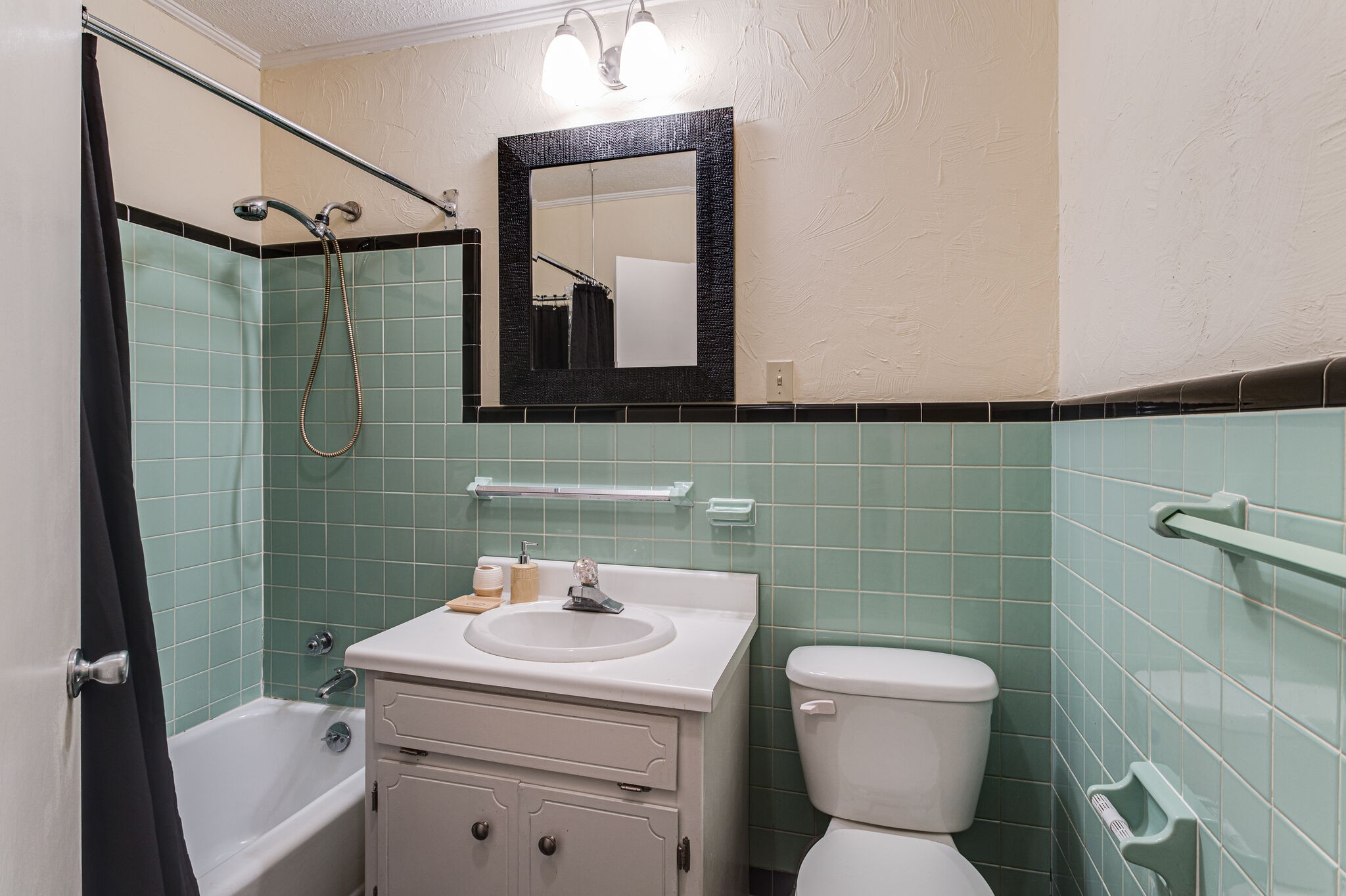 404 Monroe Floyd Road Decherd, TN 37324 - Photo 27 of 44 a bathroom with a toilet sink and mirror