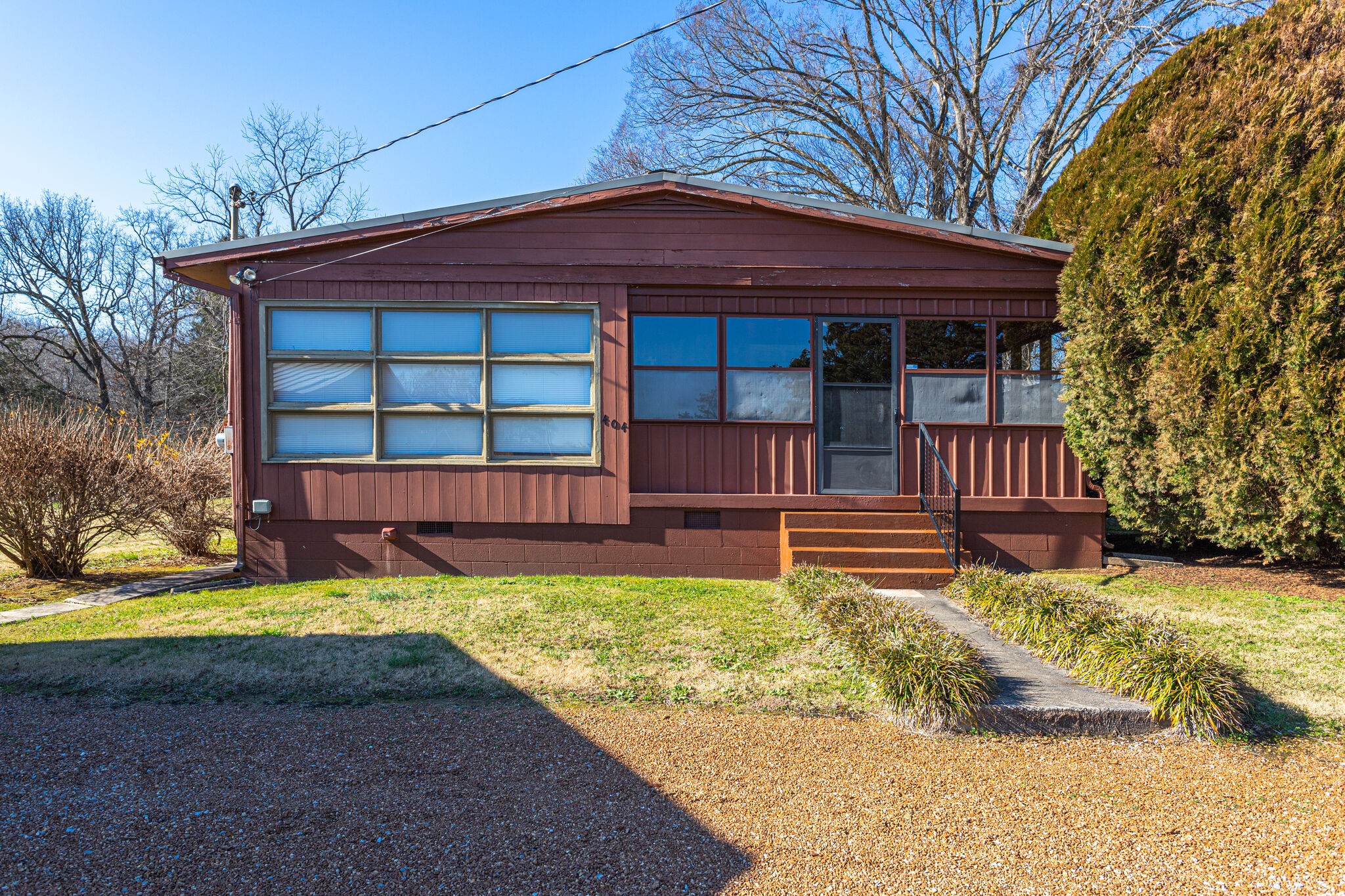 404 Monroe Floyd Road Decherd, TN 37324 - Photo 4 of 44 a view of a house with a yard