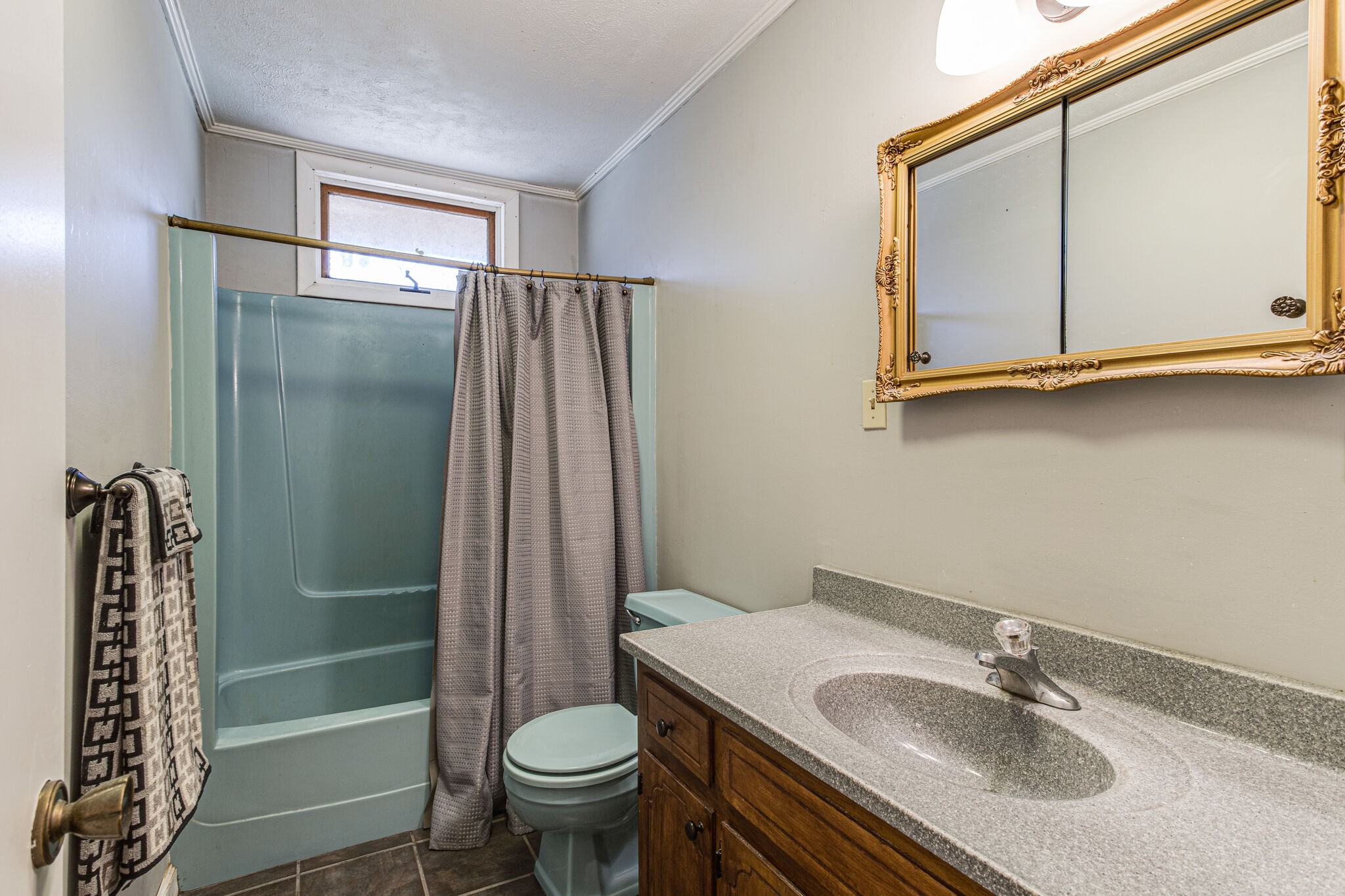 404 Monroe Floyd Road Decherd, TN 37324 - Photo 32 of 44 a bathroom with a sink toilet and shower