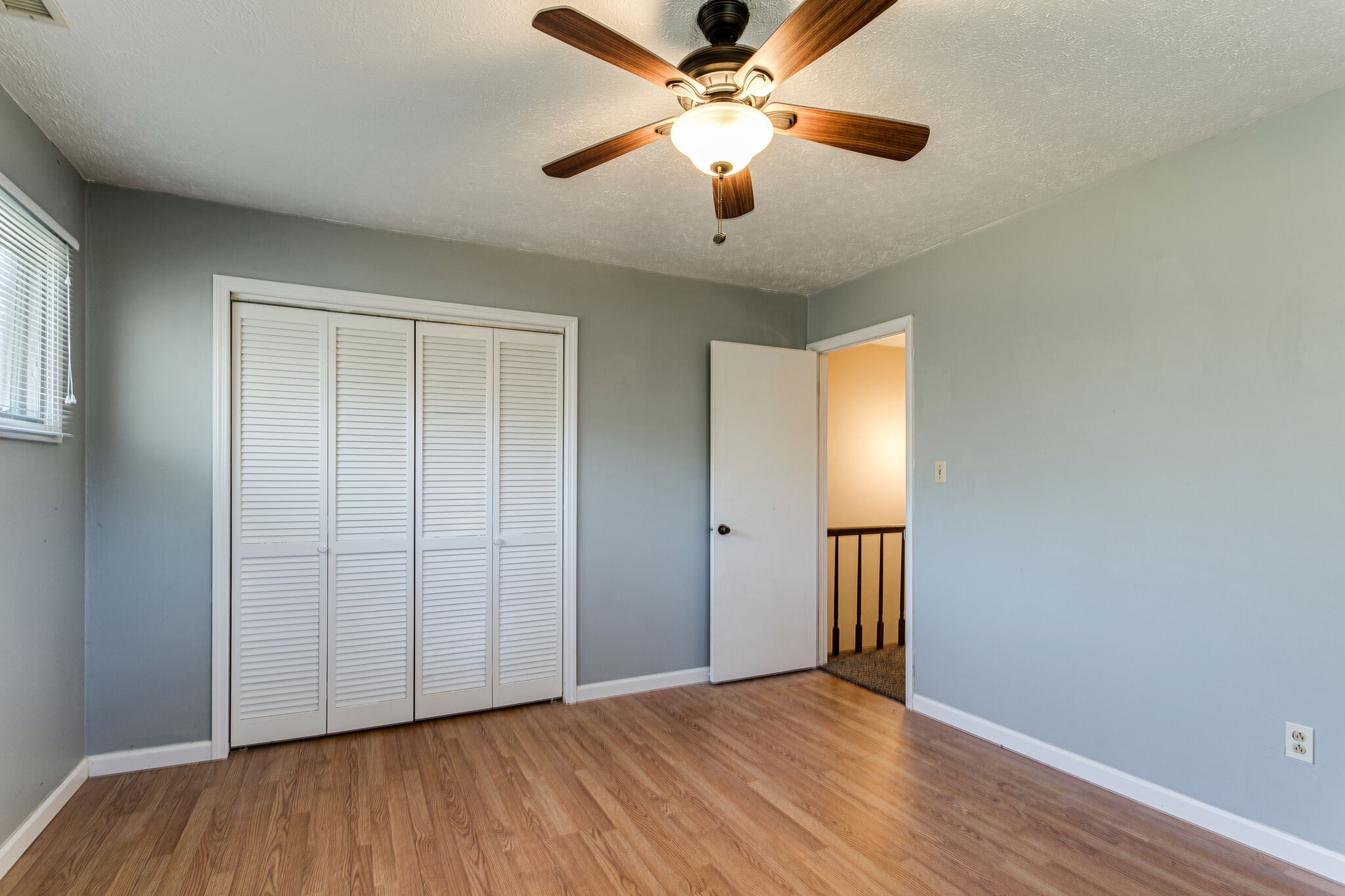 404 Monroe Floyd Road Decherd, TN 37324 - Photo 34 of 44 a view of an empty room with wooden floor
